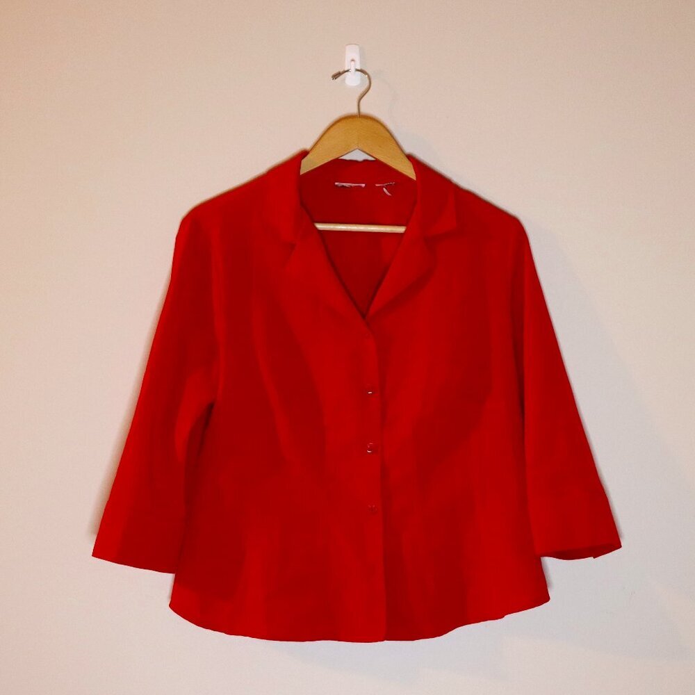 Red button-down dress shirt, with button detail at the end of the sleeve